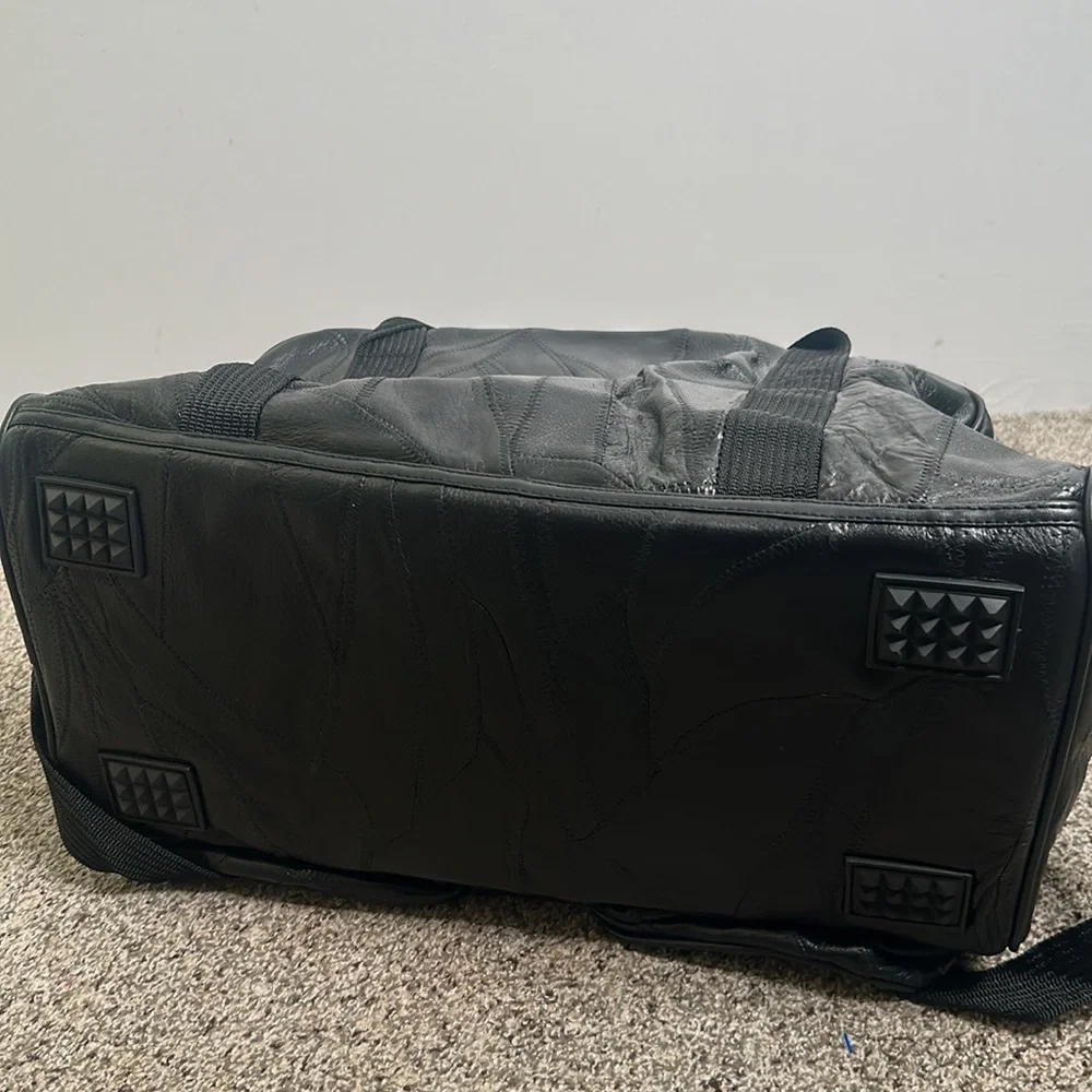 Black leather Bay Area celebrity/AM golf tournament bag